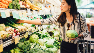 A woman shopping at a grocery store